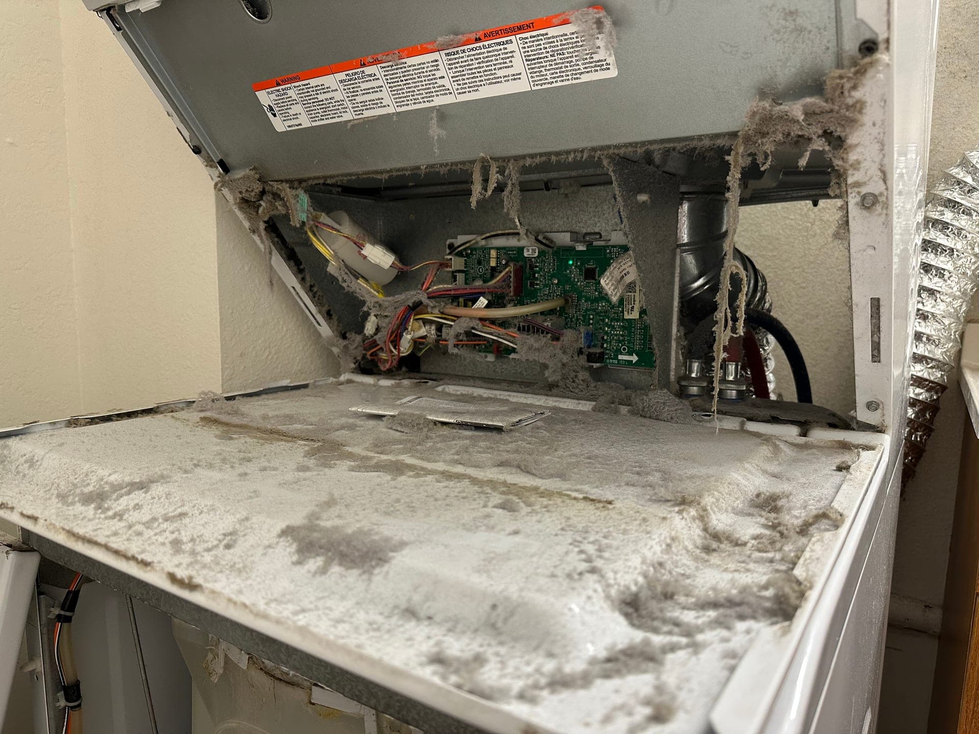 Max working on a refrigerator