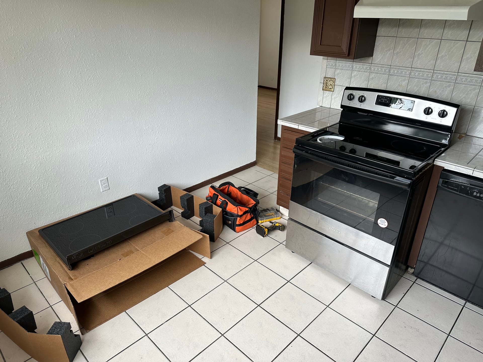 SWFL appliance repair technician servicing a refrigerator